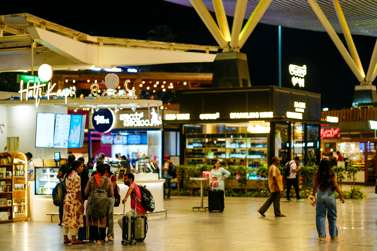 Context photo: travelers moving through an airport terminal at night; this is not the family described in the case.